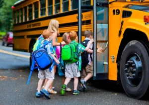 school kids going on a school bus